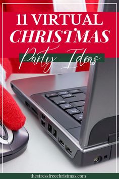 a laptop computer sitting on top of a desk next to a mouse and christmas tree