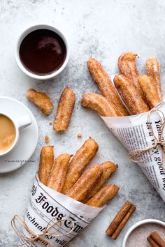 cinnamon sugar churros and coffee on a table