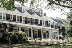 a large white house with lots of windows