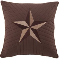 a brown pillow with a star on it