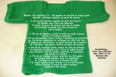 a green knitted sweater with words written on it