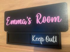 two neon signs that say,'emma's room keep out'and'ema's room '