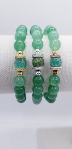 This beautiful bracelet is made with 8mm Aventurine gemstone beads. The bracelet comes with sparkling standoffs in three colors, Rose Gold, Silver and Gold. The small size 4mm beads are 14k gold, silver and rose gold  plated that will not fade or tarnish. Made with elastic stretch cord in different sizes.   CARE INSTRUCTIONS  To maintain the order quality of your bracelet, please: - Avoid contact with water, perfumes and other chemicals.  - Remove when sleeping, exercising or doing other physically strenuous activities.  - Store your beloved jewelry in a cool dry place.  - Roll bracelet On and Off, be sure to not overstretch the elastic cord.  * For natural gemstones, due to their organic nature, may vary slightly in color, shape or markings from the picture.  SIZES  Please select the leng Elastic Beads Bracelets, Elastic Beaded Bracelets, Stretchy Bracelets Diy, Small Beaded Bracelets Diy, Gemstone Bracelets Ideas, Small Bead Bracelets Ideas, Small Bead Bracelet, Gems Bracelet