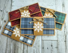 Let me help you make this Christmas extra special! These gift card holders make gift giving so easy! Gift card holders, handmade by me. Featuring adorable white snowflake design with rustic twine bow. Can also be used as a money envelope, with bills folded in half. There are 4 plaid patterns in total, so orders of more than 4 gift card holders will contain duplicates. Gift card is secured in the folded encasement which is held closed by the embellished sliding band.  Thanks for looking! To shop my store, click here: aknotes.etsy.com Feel free to message me with any questions or for bulk ordering! Approx. 5.25 inches long and 2.8 inches tall and easily fit a standard sized gift card. If using for money, bills must be folded in half as shown in pictures. Envelopes are also available that are Christmas Gift Card Presentation, Easy Gift Card Holders, Money Cards Holder, Christmas Money Cards, Gift Card Presentation, Staff Appreciation Gifts, Twine Bow, Coordinates Gift, Money Envelope