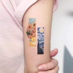 a woman with a tattoo on her arm holding up a piece of art that has sunflowers in it