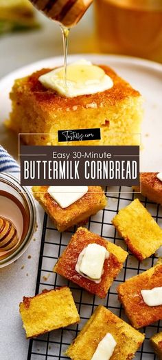 buttermik cornbreads on a cooling rack with honey syrup being drizzled over them