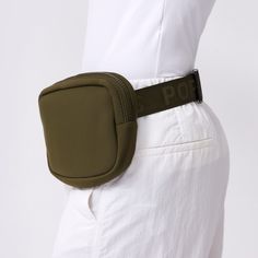 The Everyday Fanny Pack: the perfect hands-free, on the go essential. With zip pockets inside and out, a mesh compartment, an adjustable waist strap for easy fastening or shoulder wear, and sleek neoprene material that makes it machine washable, this fanny pack is a closet staple. Stay organized, hands-free, and ready for anything with this stylish fanny pack. Stylish Fanny Pack, Perfect Hands, Fanny Pack Fashion, Safari Green, Closet Staples, Waist Strap, Stay Organized, Fanny Pack, Hands Free