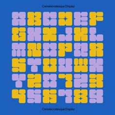 an image of some type of pattern on a blue background with yellow and purple squares