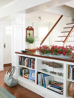 an advertisement for a book store with flowers in the window and bookshelves full of books