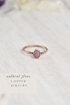 Your raw gemstone ring collection is not complete without a raw pink sapphire ring. Handmade with healing crystals and natural stones, this copper jewelry awakens the wild woman. The raw sapphire jewelry is made with electroformed copper, making each piece unique and one of a kind, just like you. Embrace your intuitive nature and click through to see more raw gemstone jewelry!