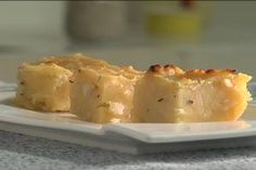 a piece of food sitting on top of a white plate