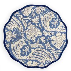 a blue and white plate sitting on top of a table