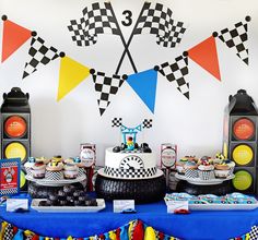 a race themed birthday party with cars and flags