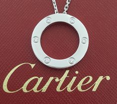 You are Purchasing a Cartier Love 6 Diamonds 18K White Gold 0.18 ct Round Brilliant Cut Diamond Necklace 16". The Necklace weighs 14 grams of solid 18K White Gold, 23.6 mm wide, 2.7 mm thick, 16" long with 6 natural diamonds weighing approximately 0.18 ct, F+ in color, VS+ in clarity, measuring approximately 2-2.1 mm in diameter. The Clasp is stamped "Cartier 750 © OJO". This is a large version, comes with service papers from Cartier & Cartier Pouch. Please follow us on Instagram for more unique items & specials: Exquisite_Jewelers_Inc ~The ring can be seen in person at Exquisite Jewelers in Palatine, IL **847**202**7889** Your happiness is our priority and we strive to provide you with the best quality products and service. If you are not fully satisfied with our product, please contact u White Gold Necklace, White Gold Necklaces, Cartier Love, Fine Jewellery Necklace, Happiness Is, Round Brilliant Cut Diamond, Brilliant Cut Diamond, Round Brilliant, Cartier