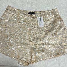 Size Medium, Pockets, Never Worn Metallic Shimmer Bottoms For Summer, Metallic Shimmer Summer Bottoms, Elegant Gold Shorts For Summer, Gold Shorts For Night Out In Spring, Gold Shorts For Spring Night Out, Chic Shimmer Bottoms For Summer, Chic Metallic Shorts For Spring, Trendy Gold Shorts For Spring, Fitted Silver Shorts For Summer