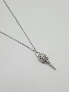 This necklace features a beautiful silver bird skull pendant! If you love birds, skulls, or the macabre, this one might be for you. All components are nickel free, and the chain is 18 inches long. Bird Skull Necklace, Crow Skull, Raven Skull, Silver Bird, Bird Skull, Skull Jewelry, Skull Necklace, Skull Pendant, Creepy Cute