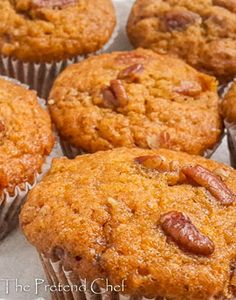 several muffins sitting on top of a piece of paper