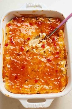 a casserole dish with meat and cheese in it, ready to be eaten