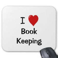 a mouse pad with the words i love book keeping and a red heart on it