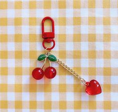 Our cherry keychain can be a cute gift for yourself, your girlfriend, wife, family, or friends 🎁 It features a gold-colored chain, a pair of cherries, a shiny heart, and a red clasp to match! With our red cherry key accessory, you can customize and decorate your cell phone, AirPods case cover, bag, pouch, and backpack. It is a very cute and adorable keychain accessory. ❤ DETAILS ❤ Color: red Weight: 9 grams * Our items are shipped securely in a cute paper gift bag inside of a padded bubble enve Cherry Keychain, Girly Car Accessories, Girly Car, Keychain Accessories, Key Accessories, Cute School Supplies, Red Cherry, Paper Gift Bags, Airpods Case