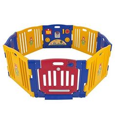 a child's playpen with blue, yellow and red panels on the sides