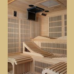 the inside of a sauna with wooden benches