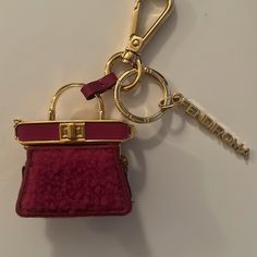 Fendi Bag Charm/Keychain/Necklace With Pink Shearling Fur. Features Gold Hardware. Perfect For Adding Style To Your Bag, A Stunning Bag Charm, Great As A Key Charm. Has A Gold Chain, Can Be Worn As A Necklace Fendi Bag Charm, Fendi Pink, Keychain Necklace, Fendi Bag, Fendi Accessories, Bag With Chain, Charm Keychain, Angelina Jolie, Pink Bag