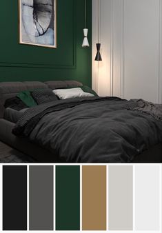 a bedroom with dark green walls, white trim and grey bedding is featured in this color scheme