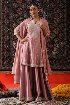 Rose pink kurta with gota patti, zari embroidery in floral pattern. Paired with stripe embroidered matching sharara and border embroidered dupatta. - Aza Fashions