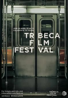 an advertisement for the tribe film festival in front of a subway car with its doors open