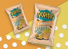 two bags of potato chips sitting next to each other on a yellow and white polka dot background