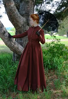 "Experience the fashion of centuries past wearing this cotton dress - a true Victorian cut. From a very young age, this is what our designer would often envision when thinking of classic \"Victorian fashion.\" From the tailored fit of the straight cut bodice to the modest high collar neckline and long tapered set sleeves, this dress is perfect! The graceful four-paneled skirt is full enough to accommodate a hoop or petticoat. Front button closure with metal button accents. What a delightful dres Pioneer Clothing, Victorian Gown, 1800s Fashion, Victorian Costume, Retro Pin Up, Victorian Clothing, Victorian Women, Historical Dresses, Moda Vintage