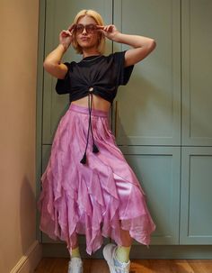 Show some ruffle love in our Salvia Skirt. An A Line knee length skirt with beautiful chiffon ruffles cascading down. A stylish piece that is easy to dress up with a white shirt and heels or down with a t-shirt and trainers.Fabric: 100% polyester chiffon and 100% polyester satin.Model wears size UK 8.This item is Dry Clean Only.