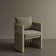 a chair that is made out of wood and has a cushion on the armrest