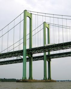 a large bridge spanning the width of a body of water