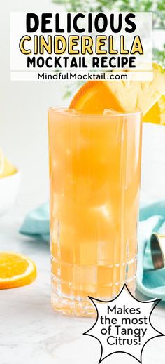 a tall glass filled with orange juice and garnished with an orange slice