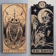 two wooden tarot cards with skeletons on them