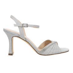 A stunning evening sandal that delivers a touch of modern elegance to your look. Chic pleats of  lustrous satins and metallics are accented with a jewel-encrusted, asymmetrical crystal band, giving a slender and graceful appearance to the foot. Set on a high, but not too high, elegantly shaped heel, and secured with a chic ankle-strap, Agnes by Nina is a sandal that will be a chic addition to your evening footwear wardrobe. $83.95 Elegant Glitter Sandals For Wedding, Elegant Evening Wedding Sandals, Glamorous Glitter Sandals For Formal Occasions, Elegant Embellished Sandals For Prom, Sparkling High Heel Sandals For Formal Occasions, Elegant Sandals With Rhinestones For Special Events, Glamorous Sparkling Sandals For Gala, Elegant Rhinestone Sandals For Events, Elegant Glitter Sandals For Prom