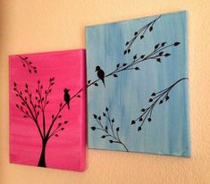 two paintings are hanging on the wall next to each other, one has a tree with birds perched on it