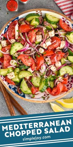 mediterranean chopped salad with tomatoes, cucumbers and onions in a bowl on a table