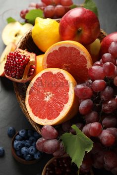 a basket filled with lots of different types of fruit