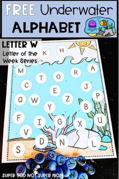 a blue and white book cover with the words free under water alphabet on it's front