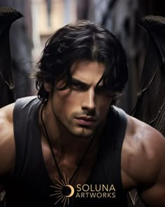 a man with wings on his chest wearing a black tank top and dark hair is looking at the camera