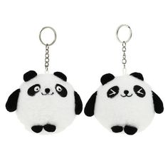 two key chains with panda bears on them