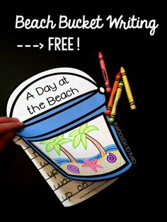 a beach bucket writing activity with crayons and crayon pencils on it