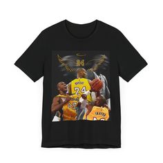 a black t - shirt with an image of two basketball players and one is holding a ball