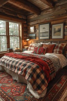 a large bed sitting in a bedroom on top of a rug next to a window