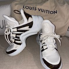 Authentic Lv Sneakers. Classic Monogram Canvas. Preloved Condition. See Photos. Shoes Have Some Beige Stains. Size- Eu 37/Us 7 Dust Bag Included. No Box. This Futuristic Sneaker Balances A Springy Wave-Shaped Outsole And An Oversized Tongue With A Low Cut Around The Ankle For A Delicate, Feminine Touch. Patent Monogram Canvas And Technical Fabrics High And Bouncy Rubber Outsole For Extra Height (5cm/2 Inch) Rubber Outsole Made In Italy Lv Sneakers, Louis Vuitton Shoes, Low Cut, Sneakers White, Monogram Canvas, Womens Shoes Sneakers, Dust Bag, Shoes Sneakers, Louis Vuitton