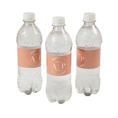 three bottled water bottles with labels on the top one is pink and the other two are white