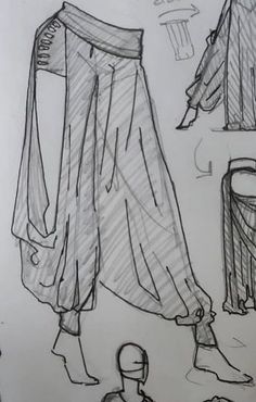 some sketches of clothes and shoes on a table